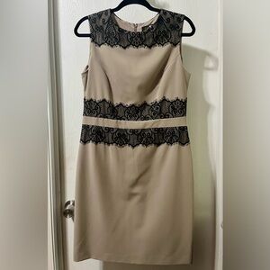 Beige dress with black lace trim